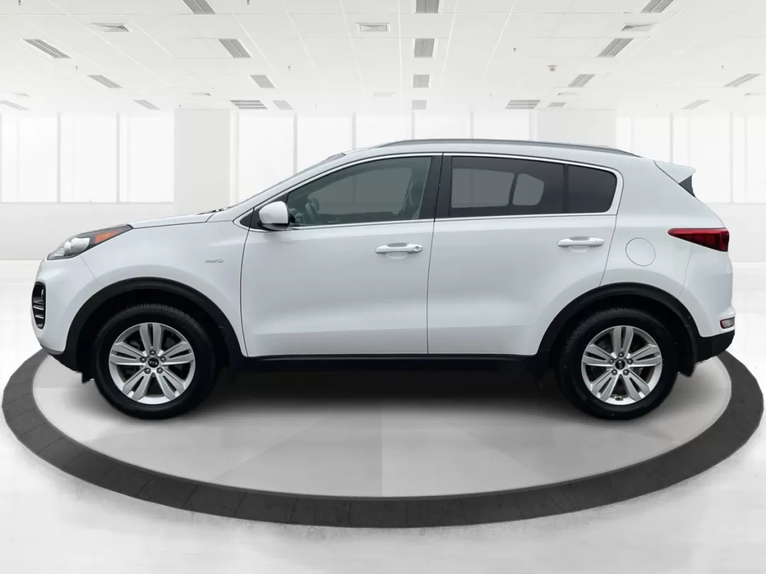 2018 Kia Sportage LX (KNDPMCACXJ7) with an Theta II 2.4L I-4 gasoline direct injection engine, located at 1184 Kauffman Ave, Fairborn, OH, 45324, (937) 908-9800, 39.807072, -84.030914 - Photo#4
