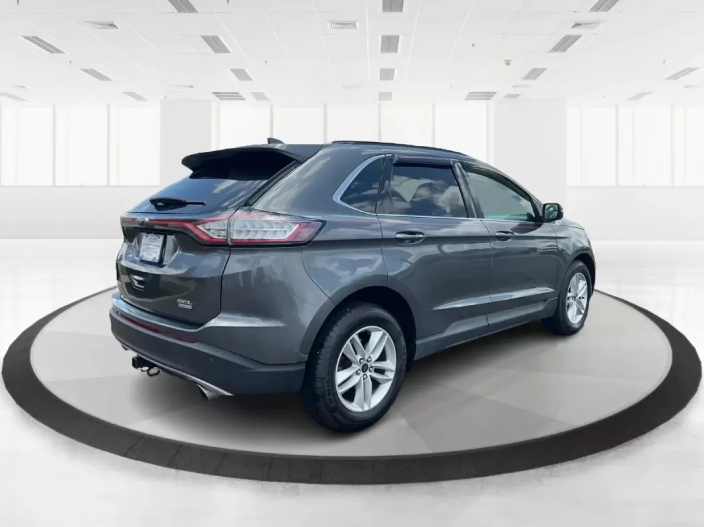 2016 Ford Edge SEL (2FMPK3J91GB) with an 3.5L V-6 DOHC engine, located at 1099 N County Rd 25A, Troy, OH, 45373, (937) 908-9800, 40.057079, -84.212883 - **Experience the Road Ahead with the 2016 Ford Edge SEL - Your Adventure Awaits!**<br /> <br /> Are you ready for your next road trip or family outing? The 2016 Ford Edge SEL is not just a car; it's a versatile SUV that caters to your lifestyle needs, making it the perfect companion for growing fami - Photo#2