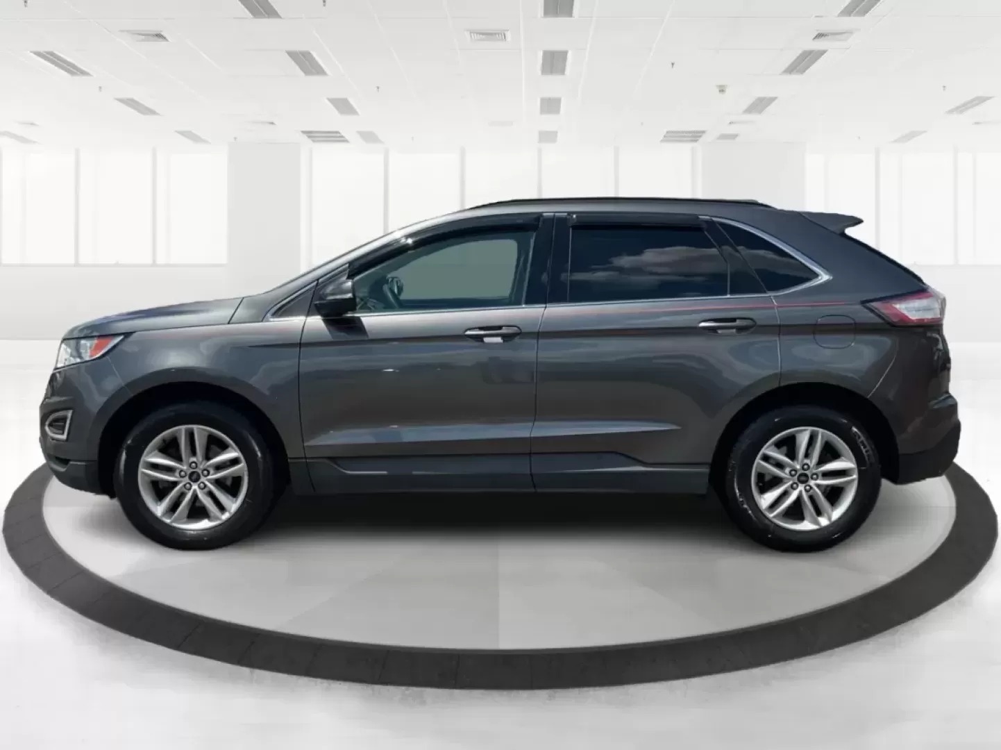 2016 Ford Edge SEL (2FMPK3J91GB) with an 3.5L V-6 DOHC engine, located at 1099 N County Rd 25A, Troy, OH, 45373, (937) 908-9800, 40.057079, -84.212883 - **Experience the Road Ahead with the 2016 Ford Edge SEL - Your Adventure Awaits!**<br /> <br /> Are you ready for your next road trip or family outing? The 2016 Ford Edge SEL is not just a car; it's a versatile SUV that caters to your lifestyle needs, making it the perfect companion for growing fami - Photo#5