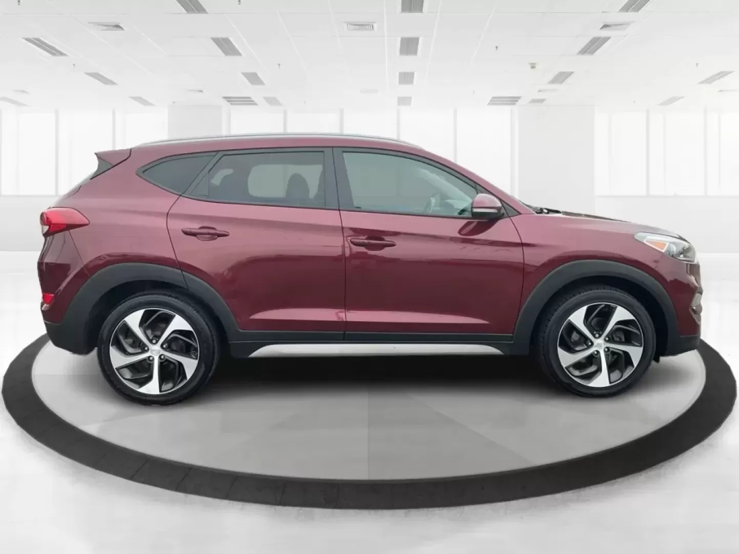 2017 Hyundai Tucson Sport (KM8J3CA29HU) with an 1.6L I-4 gasoline direct injection engine, located at 1099 N County Rd 25A, Troy, OH, 45373, (937) 908-9800, 40.057079, -84.212883 - **Discover Adventure in the 2017 Hyundai Tucson: Your Ideal SUV for Every Journey!**<br /> <br /> Are you ready to elevate your driving experience? The 2017 Hyundai Tucson in striking Ruby Wine is here, tailored for those who crave versatility and reliability in their daily adventures. Whether you'r - Photo#1