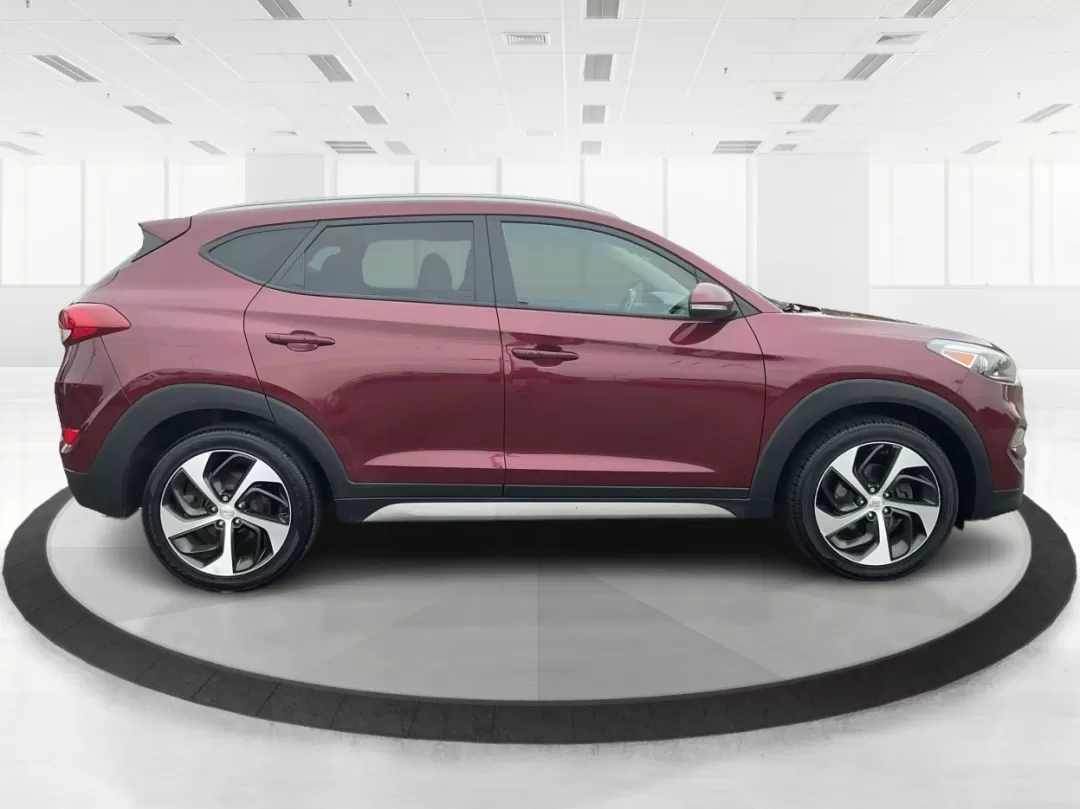 2017 Hyundai Tucson Sport (KM8J3CA29HU) with an 1.6L I-4 gasoline direct injection engine, located at 1099 N County Rd 25A , Troy, OH, 45373, (937) 908-9800, 40.057079, -84.212883 - **Discover Adventure in the 2017 Hyundai Tucson: Your Ideal SUV for Every Journey!**<br /> <br /> Are you ready to elevate your driving experience? The 2017 Hyundai Tucson in striking Ruby Wine is here, tailored for those who crave versatility and reliability in their daily adventures. Whether you'r - Photo#1