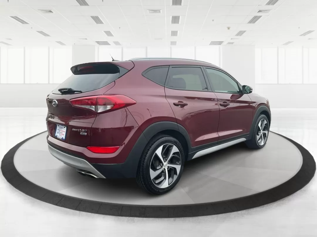 2017 Hyundai Tucson Sport (KM8J3CA29HU) with an 1.6L I-4 gasoline direct injection engine, located at 1099 N County Rd 25A , Troy, OH, 45373, (937) 908-9800, 40.057079, -84.212883 - **Discover Adventure in the 2017 Hyundai Tucson: Your Ideal SUV for Every Journey!**<br /> <br /> Are you ready to elevate your driving experience? The 2017 Hyundai Tucson in striking Ruby Wine is here, tailored for those who crave versatility and reliability in their daily adventures. Whether you'r - Photo#2