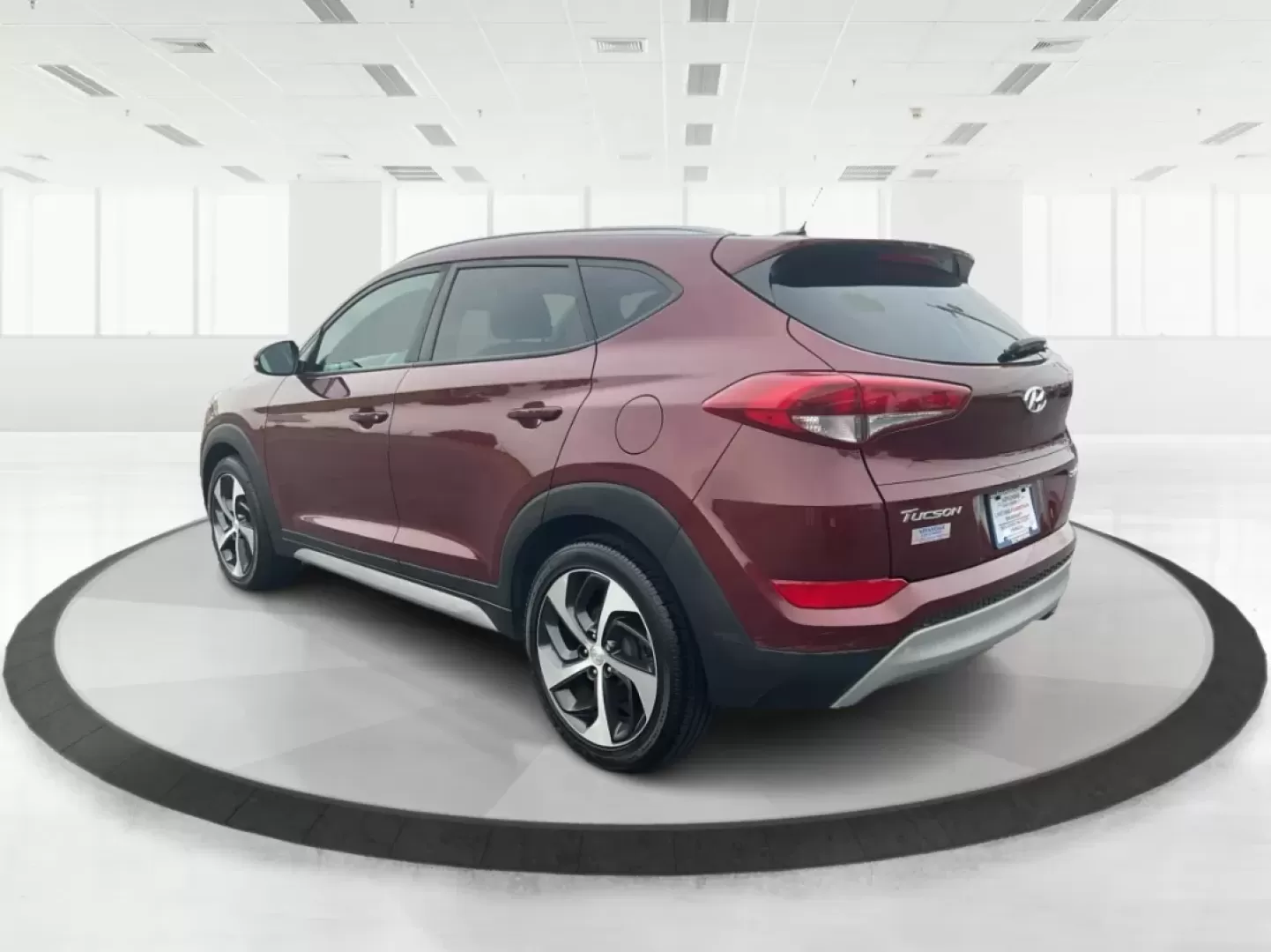 2017 Hyundai Tucson Sport (KM8J3CA29HU) with an 1.6L I-4 gasoline direct injection engine, located at 1099 N County Rd 25A, Troy, OH, 45373, (937) 908-9800, 40.057079, -84.212883 - **Discover Adventure in the 2017 Hyundai Tucson: Your Ideal SUV for Every Journey!**<br /> <br /> Are you ready to elevate your driving experience? The 2017 Hyundai Tucson in striking Ruby Wine is here, tailored for those who crave versatility and reliability in their daily adventures. Whether you'r - Photo#4