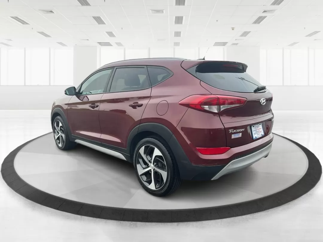 2017 Hyundai Tucson Sport (KM8J3CA29HU) with an 1.6L I-4 gasoline direct injection engine, located at 1099 N County Rd 25A , Troy, OH, 45373, (937) 908-9800, 40.057079, -84.212883 - **Discover Adventure in the 2017 Hyundai Tucson: Your Ideal SUV for Every Journey!**<br /> <br /> Are you ready to elevate your driving experience? The 2017 Hyundai Tucson in striking Ruby Wine is here, tailored for those who crave versatility and reliability in their daily adventures. Whether you'r - Photo#4