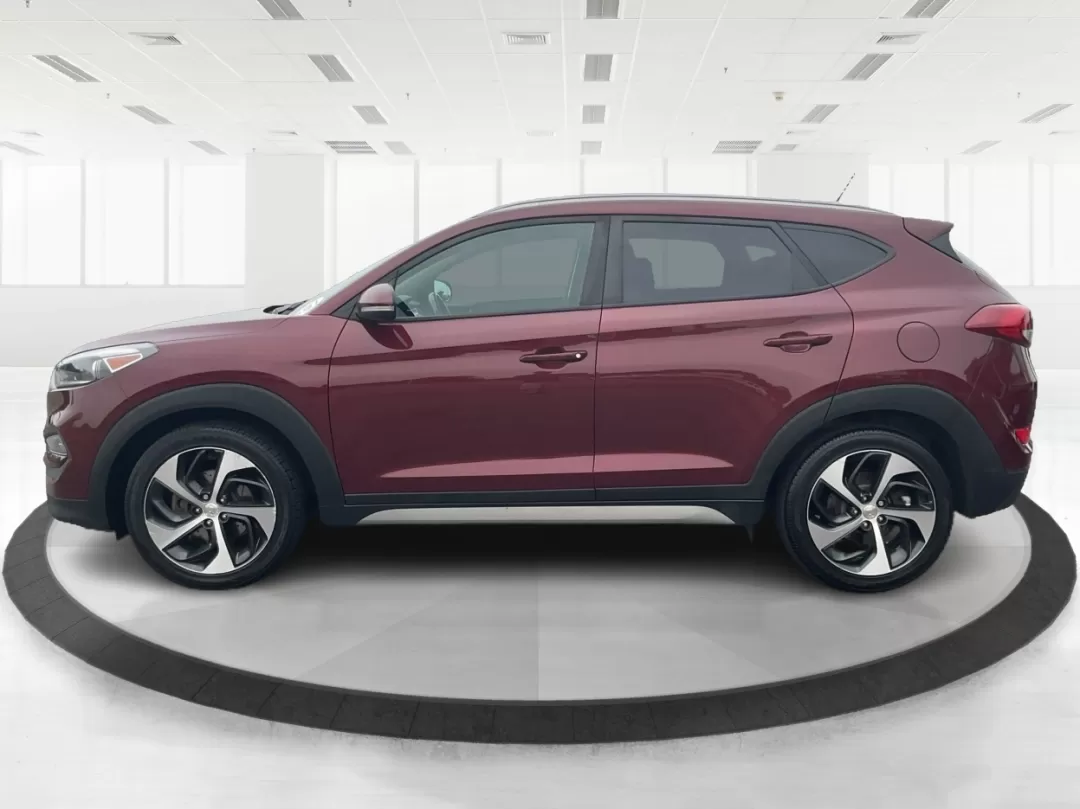 2017 Hyundai Tucson Sport (KM8J3CA29HU) with an 1.6L I-4 gasoline direct injection engine, located at 1099 N County Rd 25A , Troy, OH, 45373, (937) 908-9800, 40.057079, -84.212883 - **Discover Adventure in the 2017 Hyundai Tucson: Your Ideal SUV for Every Journey!**<br /> <br /> Are you ready to elevate your driving experience? The 2017 Hyundai Tucson in striking Ruby Wine is here, tailored for those who crave versatility and reliability in their daily adventures. Whether you'r - Photo#5