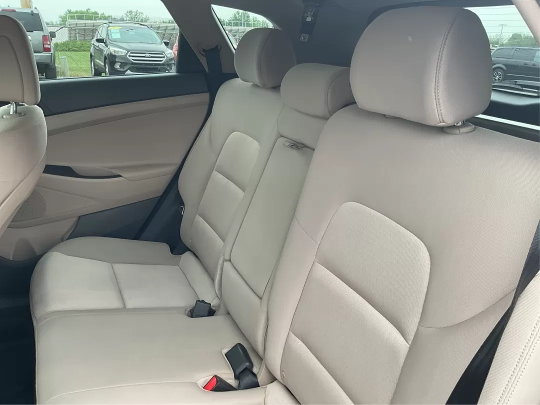 2017 Hyundai Tucson Sport (KM8J3CA29HU) with an 1.6L I-4 gasoline direct injection engine, located at 1099 N County Rd 25A , Troy, OH, 45373, (937) 908-9800, 40.057079, -84.212883 - **Discover Adventure in the 2017 Hyundai Tucson: Your Ideal SUV for Every Journey!**<br /> <br /> Are you ready to elevate your driving experience? The 2017 Hyundai Tucson in striking Ruby Wine is here, tailored for those who crave versatility and reliability in their daily adventures. Whether you'r - Photo#10