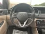2017 Hyundai Tucson Sport (KM8J3CA29HU) with an 1.6L I-4 gasoline direct injection engine, located at 1099 N County Rd 25A, Troy, OH, 45373, (937) 908-9800, 40.057079, -84.212883 - **Discover Adventure in the 2017 Hyundai Tucson: Your Ideal SUV for Every Journey!**<br /> <br /> Are you ready to elevate your driving experience? The 2017 Hyundai Tucson in striking Ruby Wine is here, tailored for those who crave versatility and reliability in their daily adventures. Whether you'r - Photo#16
