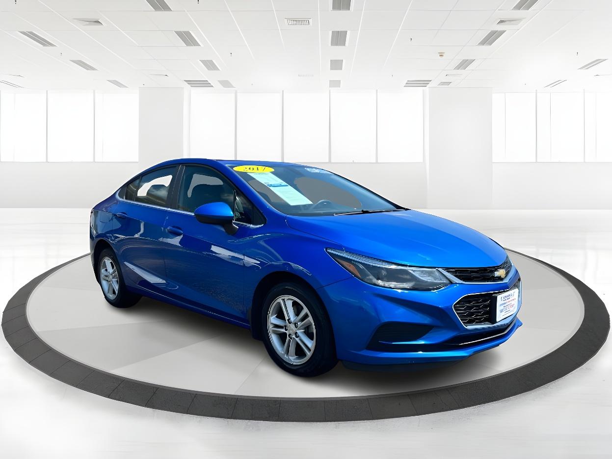 2017 Kinetic Blue Metallic Chevrolet Cruze LT Auto (1G1BE5SM6H7) with an 1.4L L4 DOHC 16V TURBO engine, 6-Speed Automatic transmission, located at 401 Woodman Dr, Riverside, OH, 45431, (937) 908-9800, 39.760899, -84.123421 - Photo #1