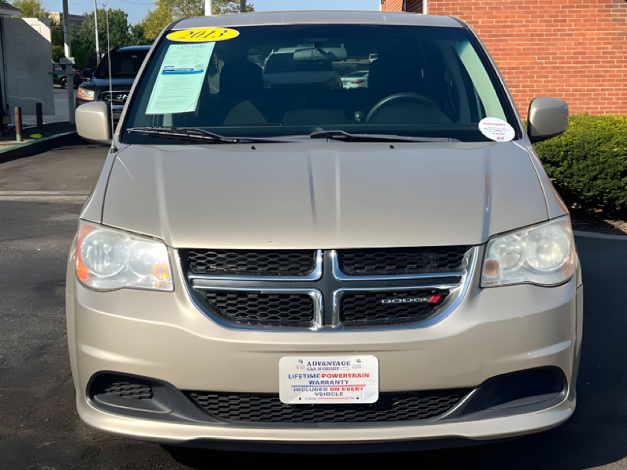 2013 Cashmere Pearl Dodge Grand Caravan SXT (2C4RDGCG2DR) with an 3.6L V6 DOHC 24V engine, 6-Speed Automatic transmission, located at 880 E. National Road, Vandalia, OH, 45377, (937) 908-9800, 39.891918, -84.183594 - Photo #7