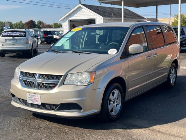 2013 Cashmere Pearl Dodge Grand Caravan SXT (2C4RDGCG2DR) with an 3.6L V6 DOHC 24V engine, 6-Speed Automatic transmission, located at 880 E. National Road, Vandalia, OH, 45377, (937) 908-9800, 39.891918, -84.183594 - Photo #4