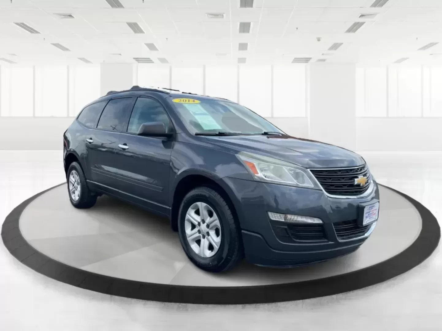 2014 Cyber Gray Metallic Chevrolet Traverse LS FWD w/PDC (1GNKRFED9EJ) with an 3.6L V6 DOHC 24V engine, 6-Speed Automatic transmission, located at 880 E. National Road, Vandalia, OH, 45377, (937) 908-9800, 39.891918, -84.183594 - 2014 Chevrolet Traverse LS FWD w/PDC - Photo#0