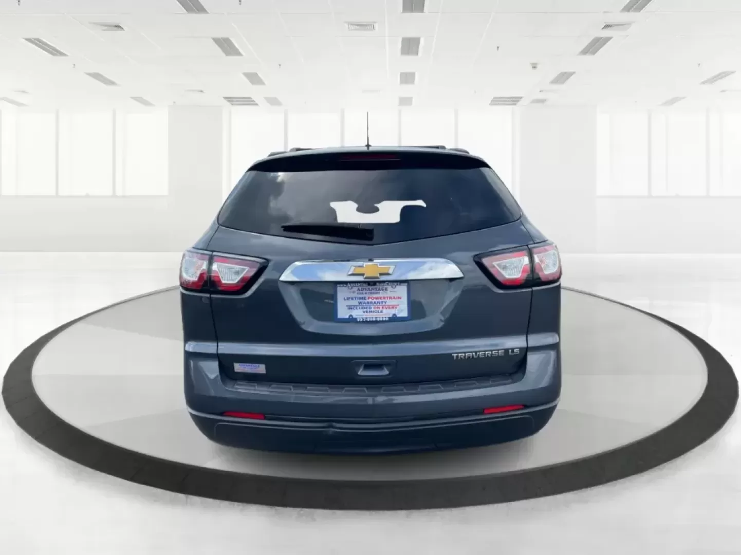 2014 Cyber Gray Metallic Chevrolet Traverse LS FWD w/PDC (1GNKRFED9EJ) with an 3.6L V6 DOHC 24V engine, 6-Speed Automatic transmission, located at 880 E. National Road, Vandalia, OH, 45377, (937) 908-9800, 39.891918, -84.183594 - 2014 Chevrolet Traverse LS FWD w/PDC - Photo#4