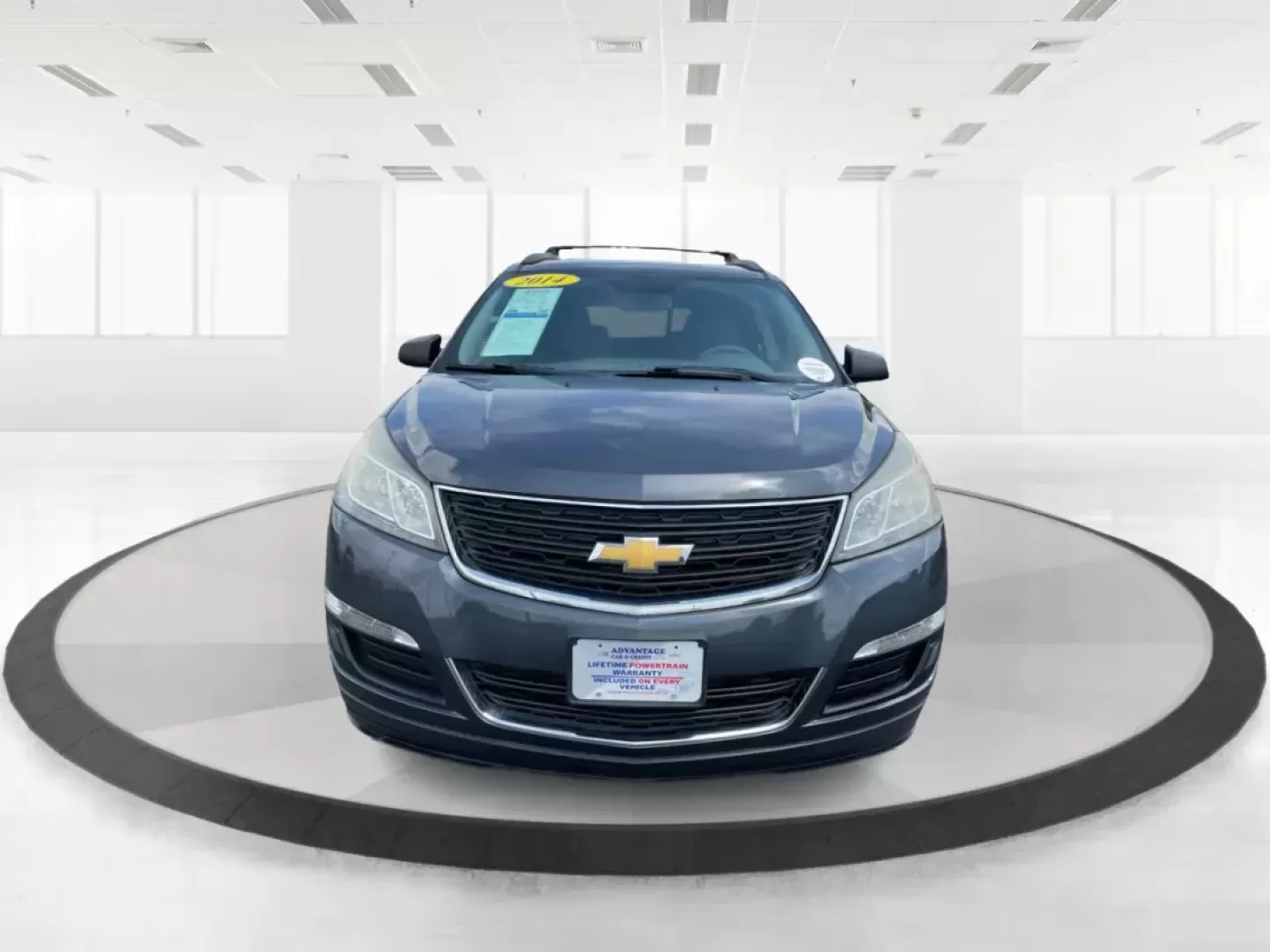 2014 Cyber Gray Metallic Chevrolet Traverse LS FWD w/PDC (1GNKRFED9EJ) with an 3.6L V6 DOHC 24V engine, 6-Speed Automatic transmission, located at 880 E. National Road, Vandalia, OH, 45377, (937) 908-9800, 39.891918, -84.183594 - 2014 Chevrolet Traverse LS FWD w/PDC - Photo#7