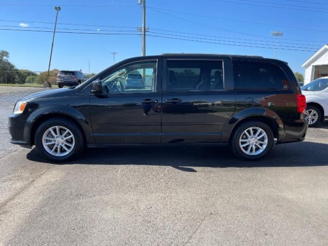 2016 Brilliant Black Crystal Pearl Coat Dodge Grand Caravan SXT (2C4RDGCG9GR) with an 3.6L V6 DOHC 24V engine, 6-Speed Automatic transmission, located at 1184 Kauffman Ave, Fairborn, OH, 45324, (937) 908-9800, 39.807072, -84.030914 - Photo #4
