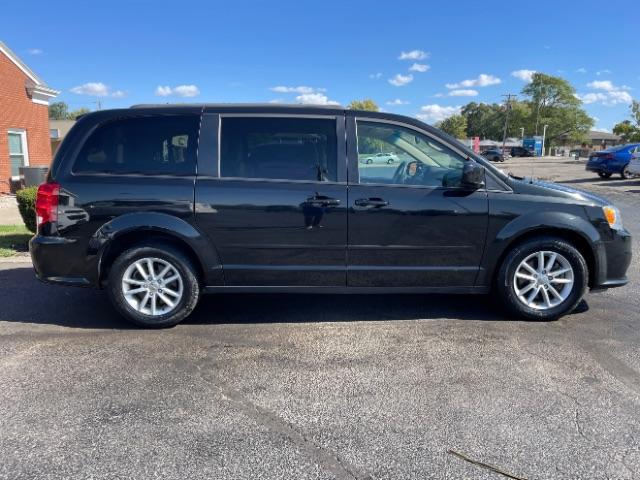 2016 Brilliant Black Crystal Pearl Coat Dodge Grand Caravan SXT (2C4RDGCG9GR) with an 3.6L V6 DOHC 24V engine, 6-Speed Automatic transmission, located at 1184 Kauffman Ave, Fairborn, OH, 45324, (937) 908-9800, 39.807072, -84.030914 - Photo #6