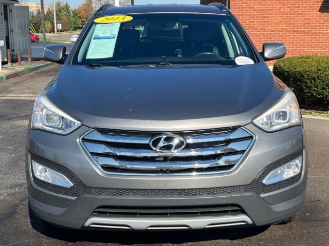 2013 Moonstone Silver Hyundai Santa Fe Sport 2.0 AWD (5XYZUDLAXDG) with an 2.0L L4 DOHC 16V engine, 6-Speed Automatic transmission, located at 1099 N County Rd 25A , Troy, OH, 45373, (937) 908-9800, 40.057079, -84.212883 - Photo #2