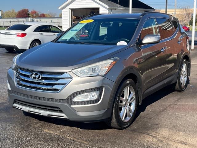 2013 Moonstone Silver Hyundai Santa Fe Sport 2.0 AWD (5XYZUDLAXDG) with an 2.0L L4 DOHC 16V engine, 6-Speed Automatic transmission, located at 1099 N County Rd 25A , Troy, OH, 45373, (937) 908-9800, 40.057079, -84.212883 - Photo #4