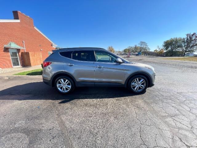 2013 Moonstone Silver Hyundai Santa Fe Sport 2.0 AWD (5XYZUDLAXDG) with an 2.0L L4 DOHC 16V engine, 6-Speed Automatic transmission, located at 1099 N County Rd 25A, Troy, OH, 45373, (937) 908-9800, 40.057079, -84.212883 - Photo #10