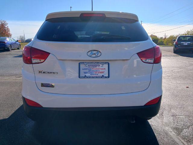 2014 White Hyundai Tucson GL Auto FWD (KM8JT3AF4EU) with an 2.0L L4 DOHC 16V engine, 6-Speed Automatic transmission, located at 880 E. National Road, Vandalia, OH, 45377, (937) 908-9800, 39.891918, -84.183594 - Photo #10