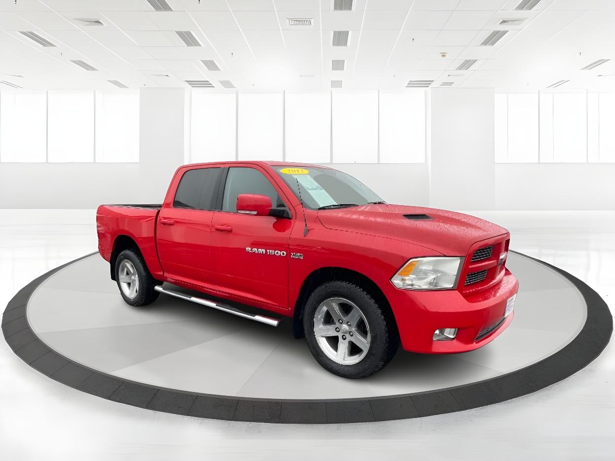 2012 Flame Red RAM 1500 Sport Crew Cab 4WD (1C6RD7MT9CS) with an 5.7L V8 OHV 16V engine, 6-Speed Automatic transmission, located at 4508 South Dixie Dr, Moraine, OH, 45439, (937) 908-9800, 39.689976, -84.218452 - Photo #1