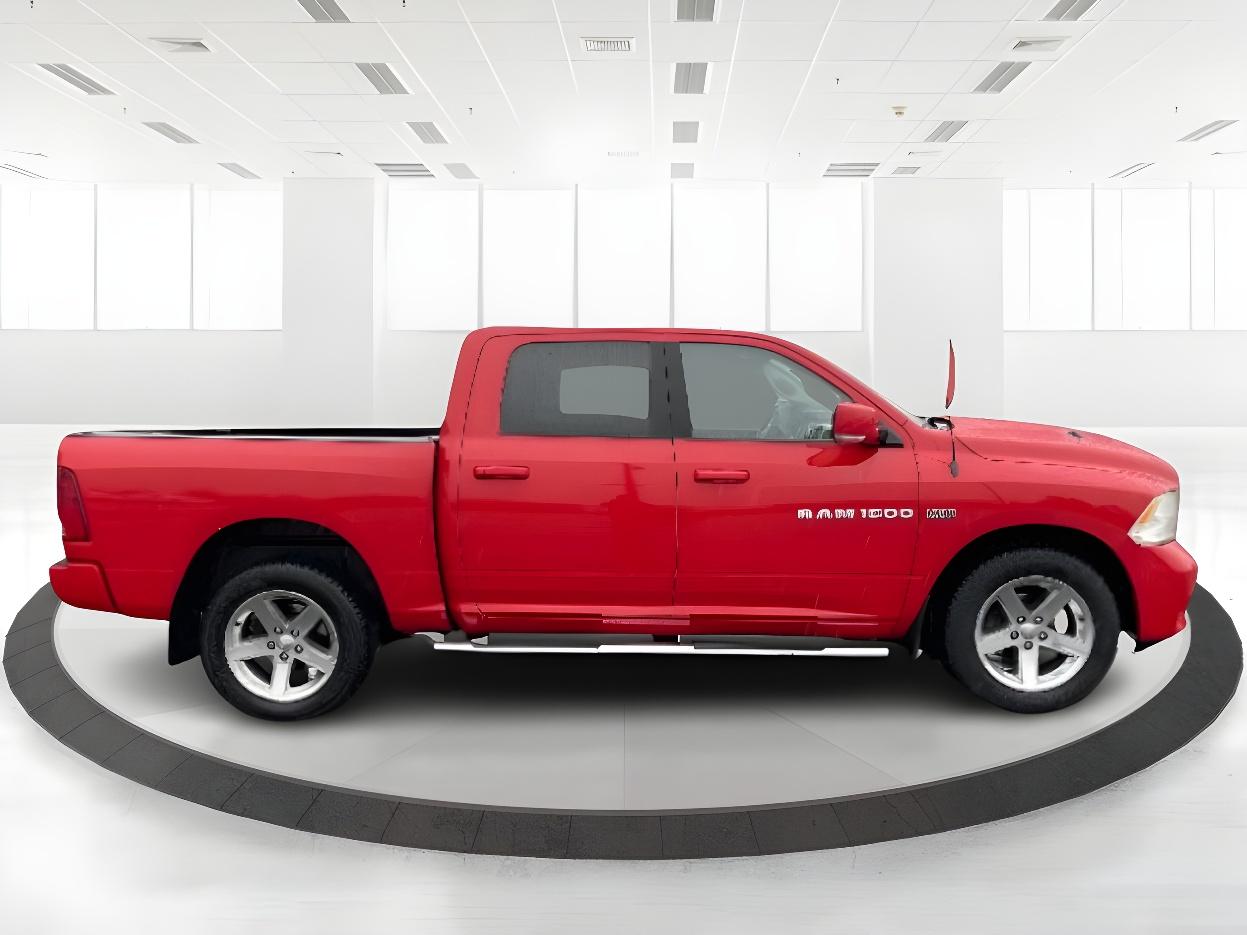 2012 Flame Red RAM 1500 Sport Crew Cab 4WD (1C6RD7MT9CS) with an 5.7L V8 OHV 16V engine, 6-Speed Automatic transmission, located at 4508 South Dixie Dr, Moraine, OH, 45439, (937) 908-9800, 39.689976, -84.218452 - Photo #3