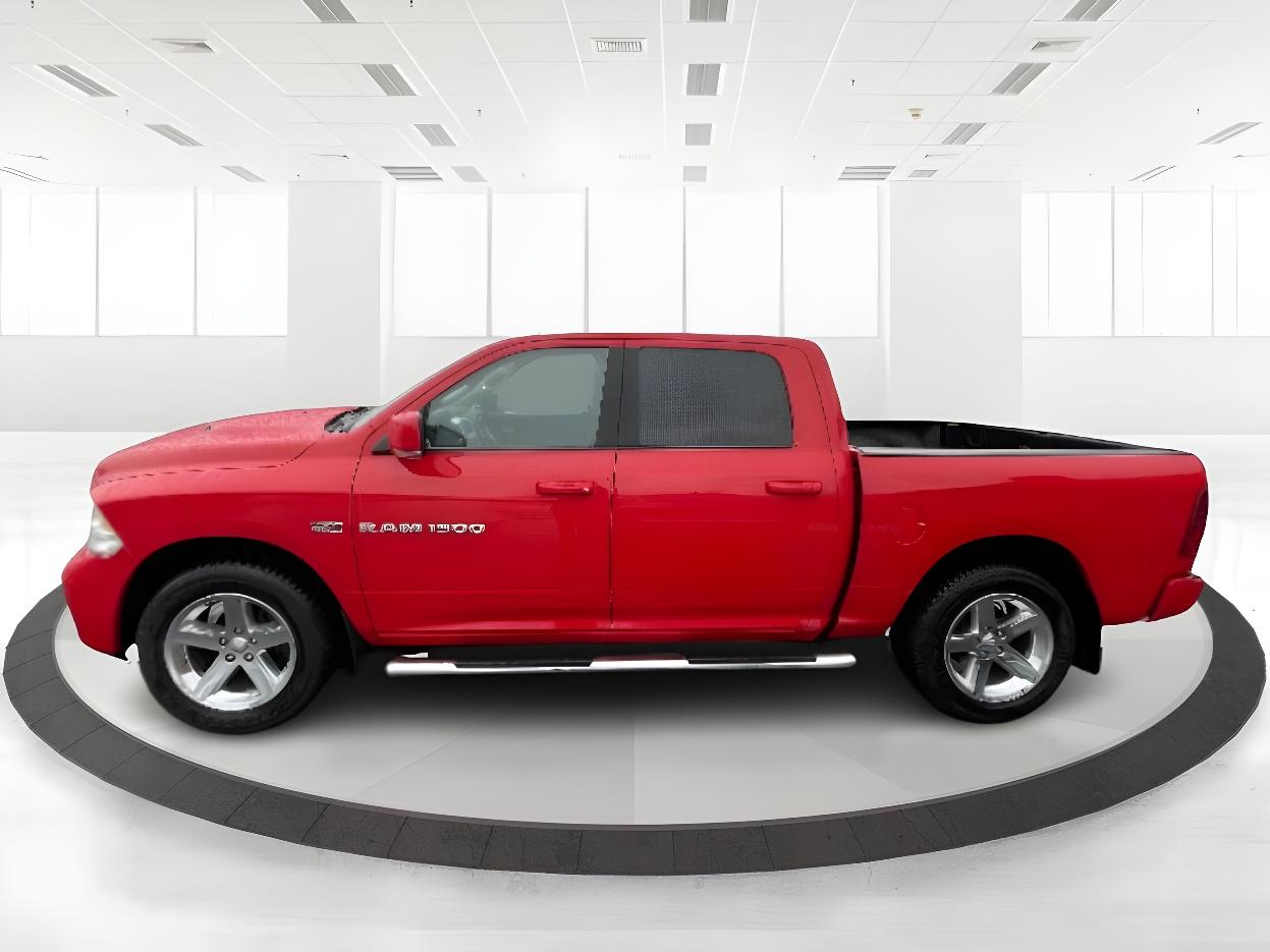 2012 Flame Red RAM 1500 Sport Crew Cab 4WD (1C6RD7MT9CS) with an 5.7L V8 OHV 16V engine, 6-Speed Automatic transmission, located at 4508 South Dixie Dr, Moraine, OH, 45439, (937) 908-9800, 39.689976, -84.218452 - Photo #7