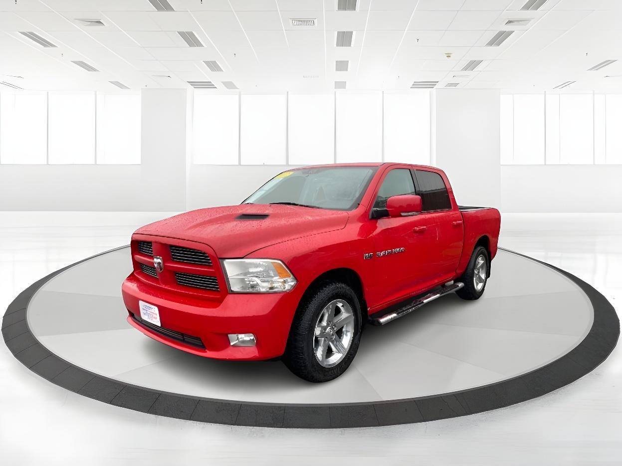 2012 Flame Red RAM 1500 Sport Crew Cab 4WD (1C6RD7MT9CS) with an 5.7L V8 OHV 16V engine, 6-Speed Automatic transmission, located at 4508 South Dixie Dr, Moraine, OH, 45439, (937) 908-9800, 39.689976, -84.218452 - Photo #11