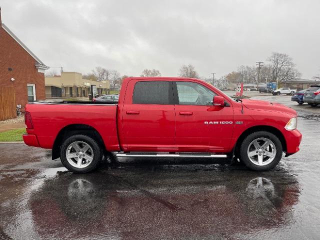 2012 Flame Red RAM 1500 Sport Crew Cab 4WD (1C6RD7MT9CS) with an 5.7L V8 OHV 16V engine, 6-Speed Automatic transmission, located at 4508 South Dixie Dr, Moraine, OH, 45439, (937) 908-9800, 39.689976, -84.218452 - Photo #6