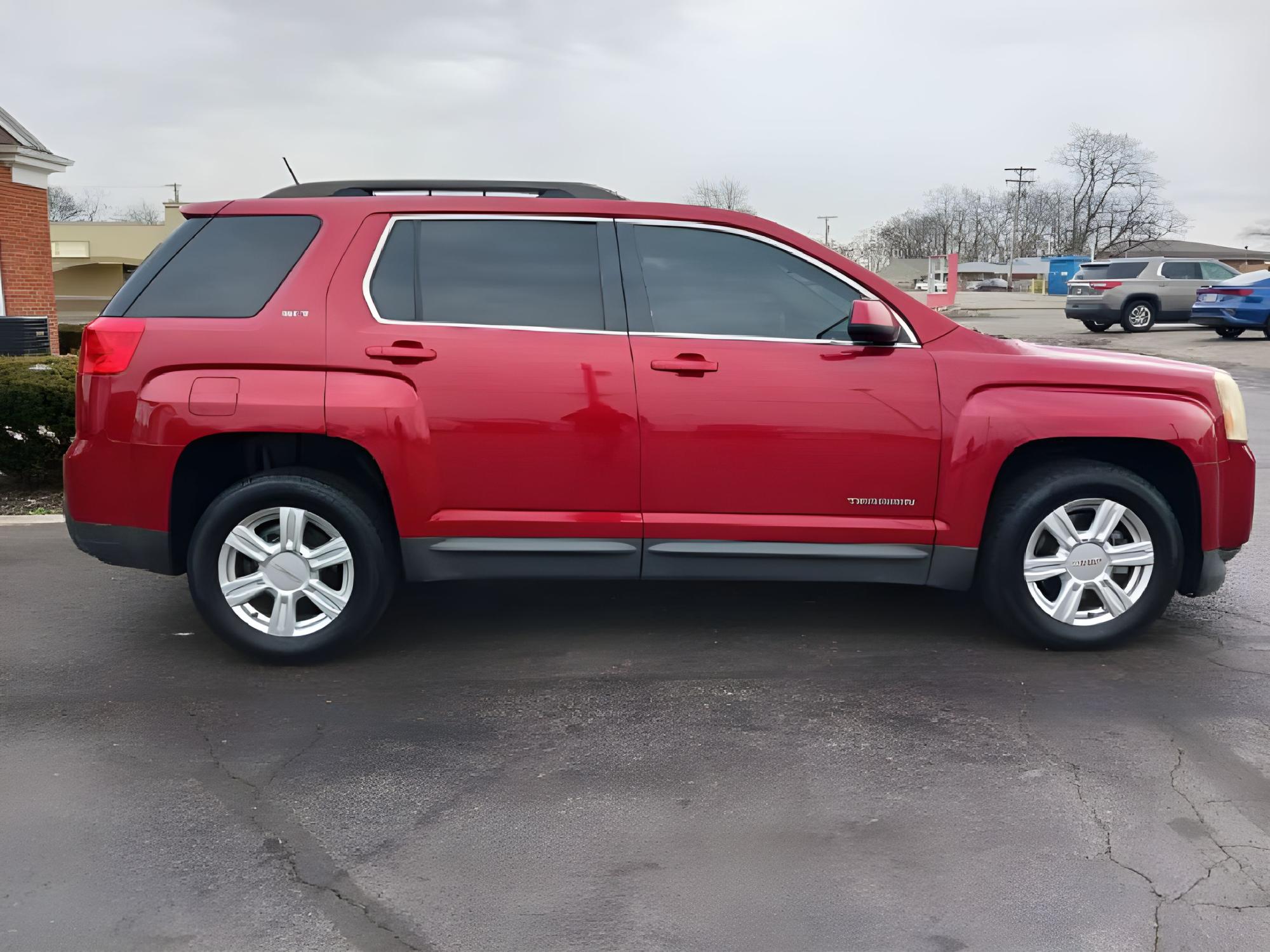 2015 Crystal Red Tintcoat GMC Terrain SLT1 FWD (2GKALSEK7F6) with an 2.4L L4 DOHC 16V engine, 6-Speed Automatic transmission, located at 1099 N County Rd 25A , Troy, OH, 45373, (937) 908-9800, 40.057079, -84.212883 - Photo #11