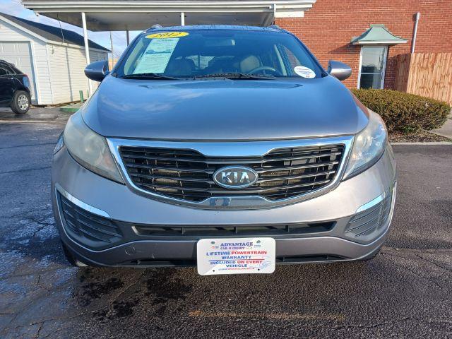 2012 Bright Silver Kia Sportage LX FWD (KNDPB3A25C7) with an 2.4L V6 DOHC 24V engine, 6-Speed Automatic transmission, located at 401 Woodman Dr, Riverside, OH, 45431, (937) 908-9800, 39.760899, -84.123421 - Photo #2