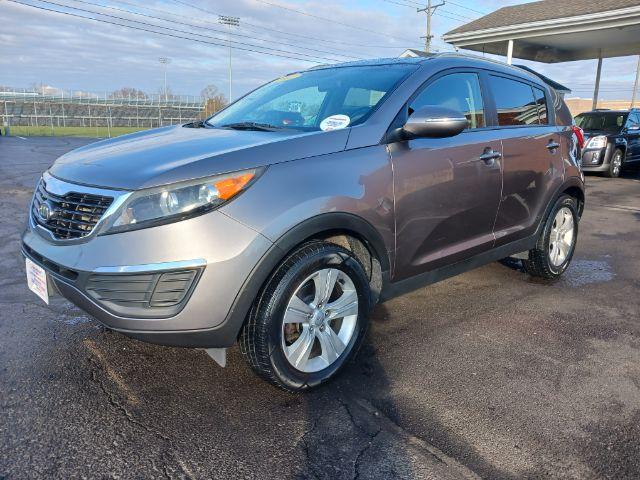 2012 Bright Silver Kia Sportage LX FWD (KNDPB3A25C7) with an 2.4L V6 DOHC 24V engine, 6-Speed Automatic transmission, located at 401 Woodman Dr, Riverside, OH, 45431, (937) 908-9800, 39.760899, -84.123421 - Photo #4