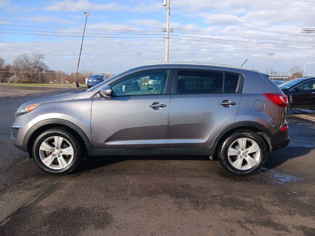 2012 Bright Silver Kia Sportage LX FWD (KNDPB3A25C7) with an 2.4L V6 DOHC 24V engine, 6-Speed Automatic transmission, located at 401 Woodman Dr, Riverside, OH, 45431, (937) 908-9800, 39.760899, -84.123421 - Photo #6