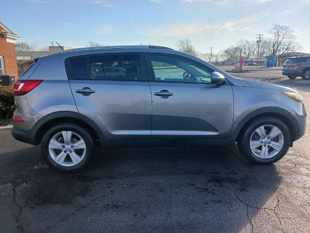 2012 Bright Silver Kia Sportage LX FWD (KNDPB3A25C7) with an 2.4L V6 DOHC 24V engine, 6-Speed Automatic transmission, located at 401 Woodman Dr, Riverside, OH, 45431, (937) 908-9800, 39.760899, -84.123421 - Photo #8