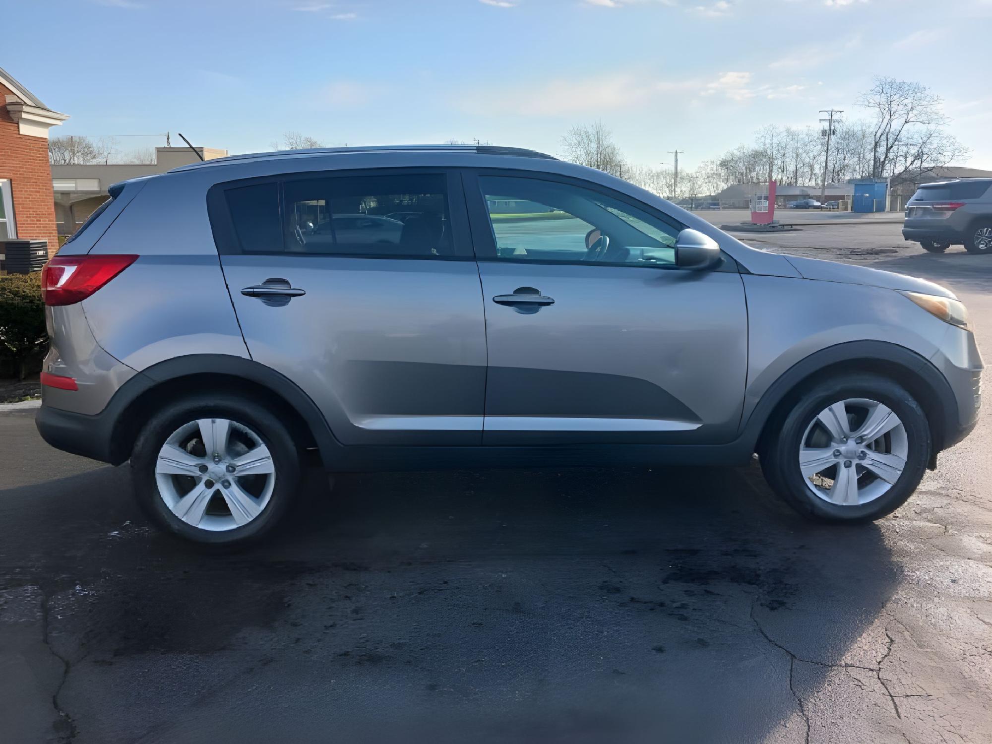 2012 Bright Silver Kia Sportage LX FWD (KNDPB3A25C7) with an 2.4L V6 DOHC 24V engine, 6-Speed Automatic transmission, located at 401 Woodman Dr, Riverside, OH, 45431, (937) 908-9800, 39.760899, -84.123421 - Photo #11