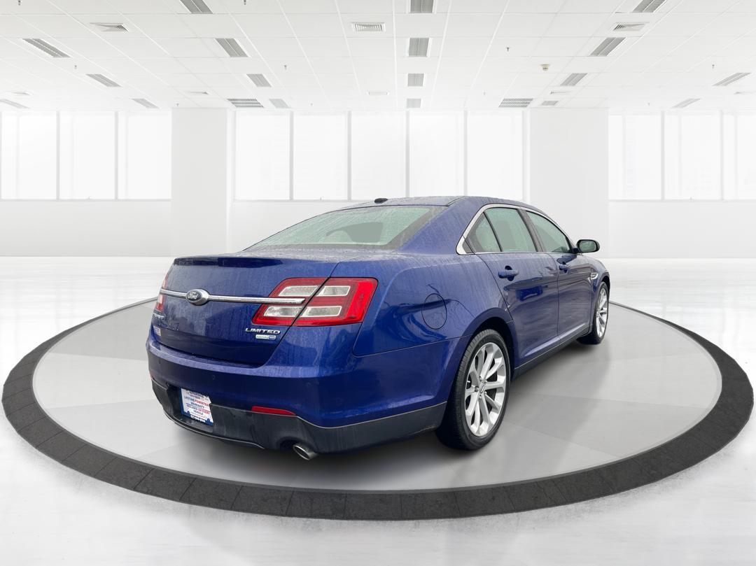 2014 Deep Impact Blue Metallic Ford Taurus Limited AWD (1FAHP2J86EG) with an 3.5L V6 DOHC 24V engine, 6-Speed Automatic transmission, located at 1184 Kauffman Ave, Fairborn, OH, 45324, (937) 908-9800, 39.807072, -84.030914 - Photo#2