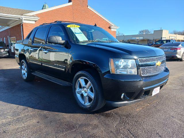 2012 Black Chevrolet Avalanche LT 4WD (3GNTKFE72CG) with an 5.3L V8 OHV 16V FFV engine, 4-Speed Automatic transmission, located at 1099 N County Rd 25A , Troy, OH, 45373, (937) 908-9800, 40.057079, -84.212883 - Photo #0