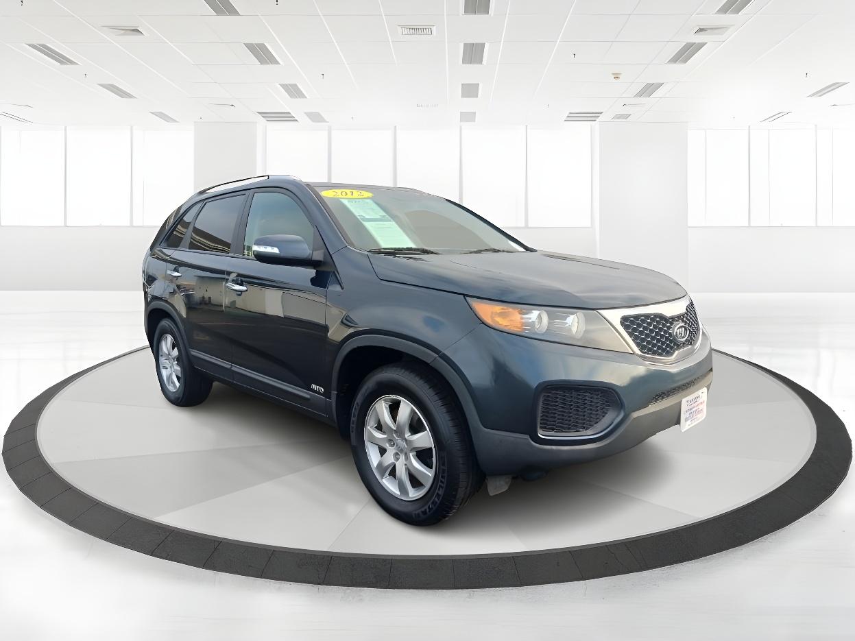 2012 Pacific Blue Kia Sorento LX 4WD (5XYKTDA2XCG) with an 3.5L V6 DOHC 24V engine, 6-Speed Automatic transmission, located at 4508 South Dixie Dr, Moraine, OH, 45439, (937) 908-9800, 39.689976, -84.218452 - Photo #1