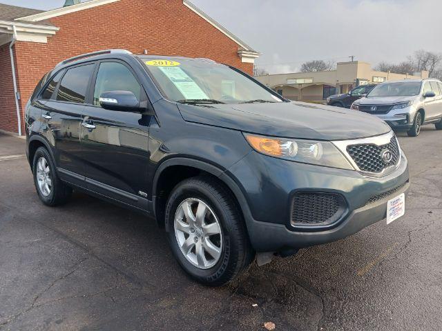 2012 Pacific Blue Kia Sorento LX 4WD (5XYKTDA2XCG) with an 3.5L V6 DOHC 24V engine, 6-Speed Automatic transmission, located at 4508 South Dixie Dr, Moraine, OH, 45439, (937) 908-9800, 39.689976, -84.218452 - Photo #0