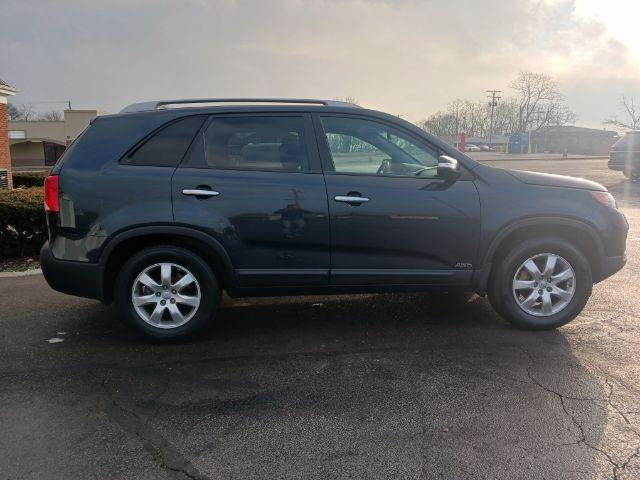 2012 Pacific Blue Kia Sorento LX 4WD (5XYKTDA2XCG) with an 3.5L V6 DOHC 24V engine, 6-Speed Automatic transmission, located at 4508 South Dixie Dr, Moraine, OH, 45439, (937) 908-9800, 39.689976, -84.218452 - Photo #8