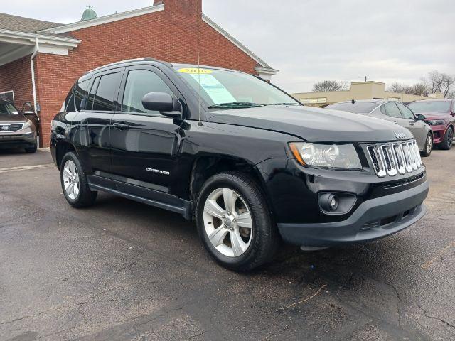 2016 Black Jeep Compass Sport FWD (1C4NJCBA6GD) with an 2.0L L4 DOHC 16V engine, located at 4508 South Dixie Dr, Moraine, OH, 45439, (937) 908-9800, 39.689976, -84.218452 - Photo #0