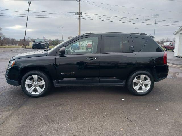 2016 Black Jeep Compass Sport FWD (1C4NJCBA6GD) with an 2.0L L4 DOHC 16V engine, located at 4508 South Dixie Dr, Moraine, OH, 45439, (937) 908-9800, 39.689976, -84.218452 - Photo #6