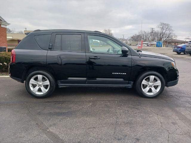 2016 Black Jeep Compass Sport FWD (1C4NJCBA6GD) with an 2.0L L4 DOHC 16V engine, located at 4508 South Dixie Dr, Moraine, OH, 45439, (937) 908-9800, 39.689976, -84.218452 - Photo #8