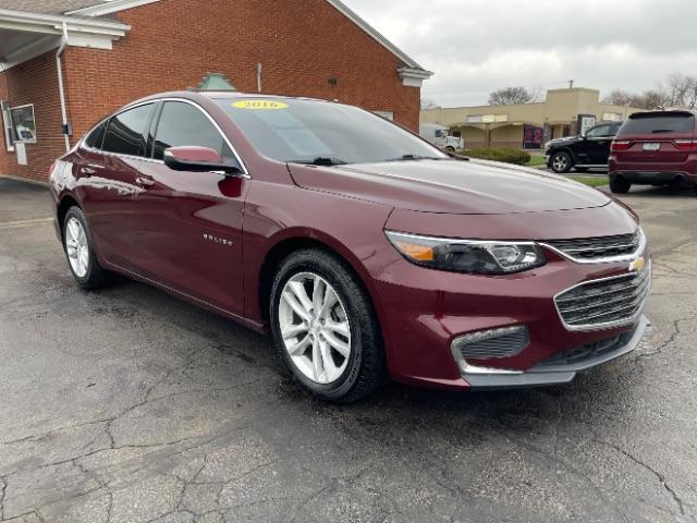 2016 Crystal Red Tintcoat Chevrolet Malibu 1LT (1G1ZE5ST1GF) with an 1.5L L4 DOHC 16V engine, 6-Speed Automatic transmission, located at 1099 N County Rd 25A, Troy, OH, 45373, (937) 908-9800, 40.057079, -84.212883 - Photo #0