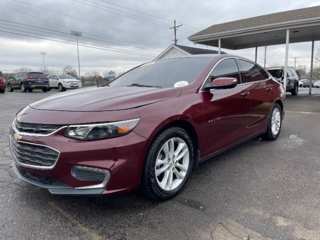 2016 Crystal Red Tintcoat Chevrolet Malibu 1LT (1G1ZE5ST1GF) with an 1.5L L4 DOHC 16V engine, 6-Speed Automatic transmission, located at 1099 N County Rd 25A , Troy, OH, 45373, (937) 908-9800, 40.057079, -84.212883 - Photo #2