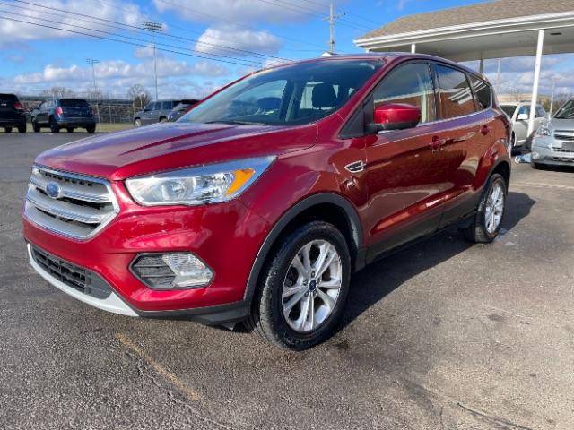 2017 Ruby Red Metallic Tinted Clearcoat Ford Escape SE 4WD (1FMCU9GD4HU) with an 1.5L L4 DOHC 16V engine, 6-Speed Automatic transmission, located at 1099 N County Rd 25A, Troy, OH, 45373, (937) 908-9800, 40.057079, -84.212883 - Photo #2