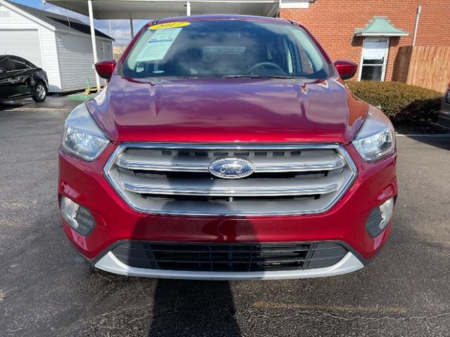 2017 Ruby Red Metallic Tinted Clearcoat Ford Escape SE 4WD (1FMCU9GD4HU) with an 1.5L L4 DOHC 16V engine, 6-Speed Automatic transmission, located at 1099 N County Rd 25A, Troy, OH, 45373, (937) 908-9800, 40.057079, -84.212883 - Photo #4