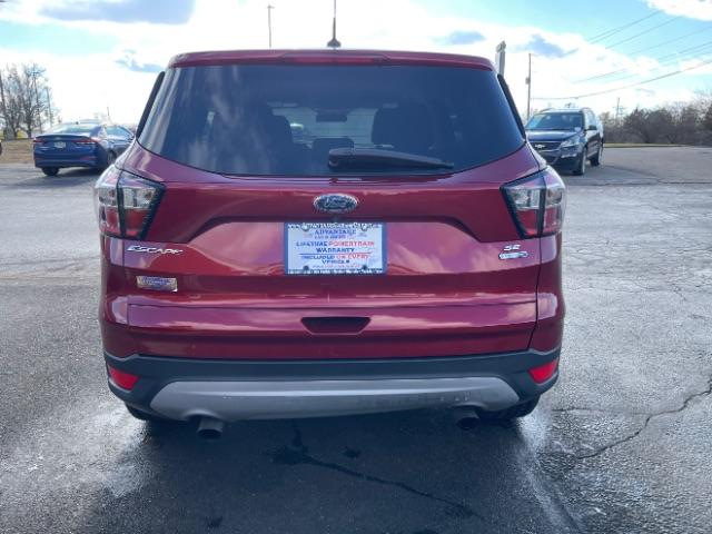 2017 Ruby Red Metallic Tinted Clearcoat Ford Escape SE 4WD (1FMCU9GD4HU) with an 1.5L L4 DOHC 16V engine, 6-Speed Automatic transmission, located at 1099 N County Rd 25A , Troy, OH, 45373, (937) 908-9800, 40.057079, -84.212883 - Photo #6