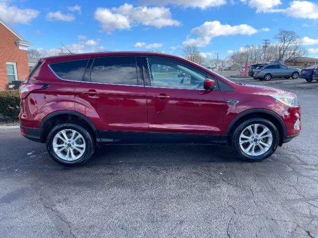 2017 Ruby Red Metallic Tinted Clearcoat Ford Escape SE 4WD (1FMCU9GD4HU) with an 1.5L L4 DOHC 16V engine, 6-Speed Automatic transmission, located at 1099 N County Rd 25A , Troy, OH, 45373, (937) 908-9800, 40.057079, -84.212883 - Photo #8