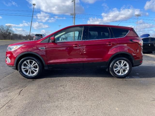 2017 Ruby Red Metallic Tinted Clearcoat Ford Escape SE 4WD (1FMCU9GD4HU) with an 1.5L L4 DOHC 16V engine, 6-Speed Automatic transmission, located at 1099 N County Rd 25A , Troy, OH, 45373, (937) 908-9800, 40.057079, -84.212883 - Photo #10