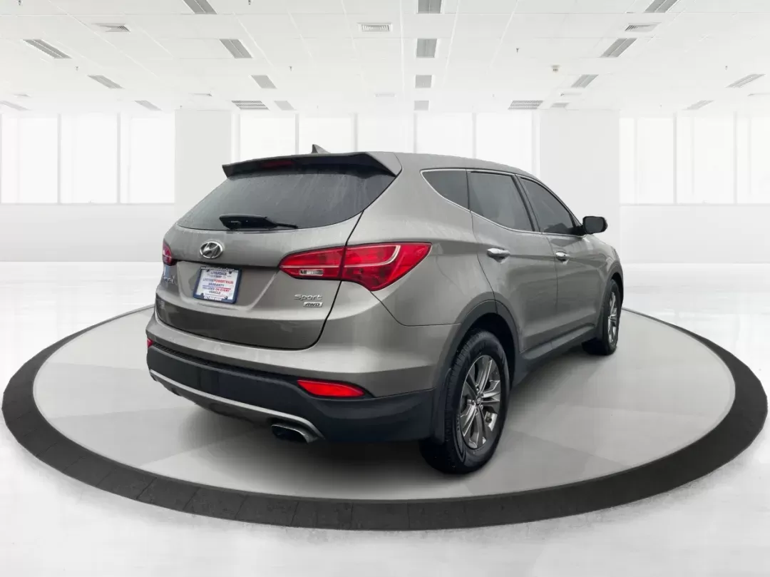 2013 Mineral Gray Hyundai Santa Fe Sport 2.4 AWD (5XYZUDLBXDG) with an 2.4L L4 DOHC 16V engine, 6-Speed Automatic transmission, located at 1184 Kauffman Ave, Fairborn, OH, 45324, (937) 908-9800, 39.807072, -84.030914 - Photo#2